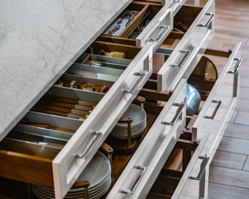 IKEA kitchen cabinets with organized drawers and built-in storage solutions