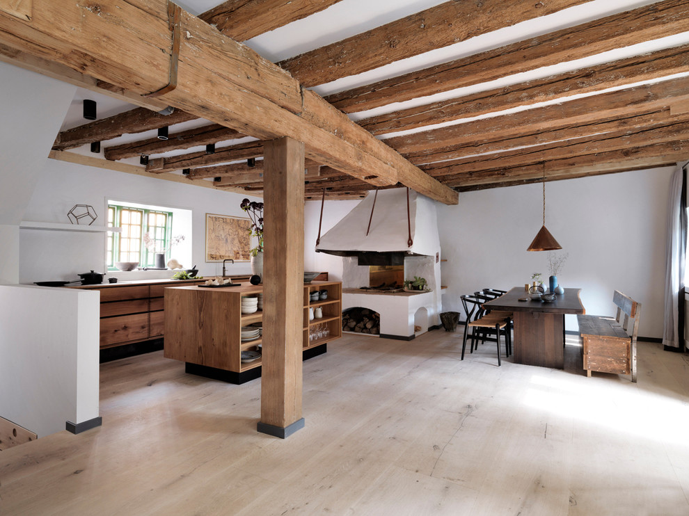 Inspiration for a country kitchen in Copenhagen with light hardwood floors and beige floor.