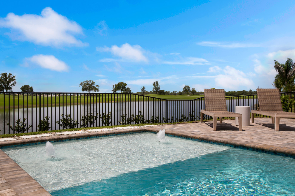 Transitional pool photo in Miami
