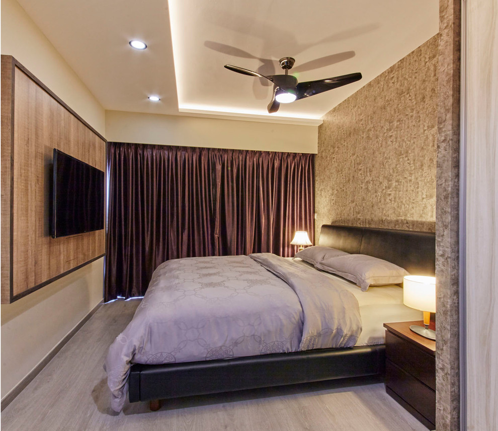Design ideas for a mid-sized modern master bedroom in Singapore with white walls and plywood floors.