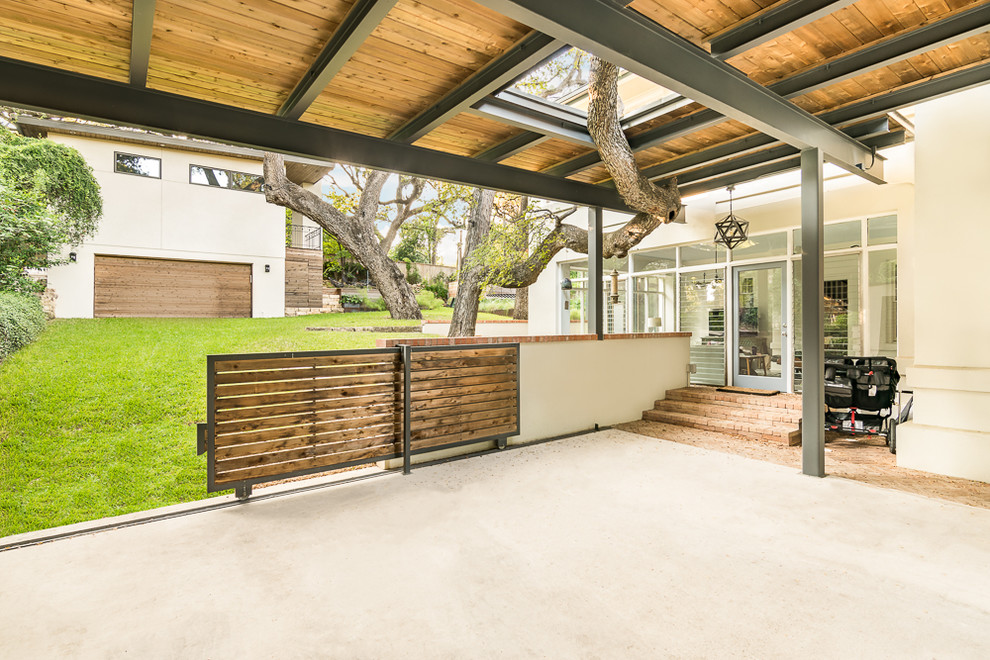 Design ideas for a large traditional detached two-car carport in Austin.
