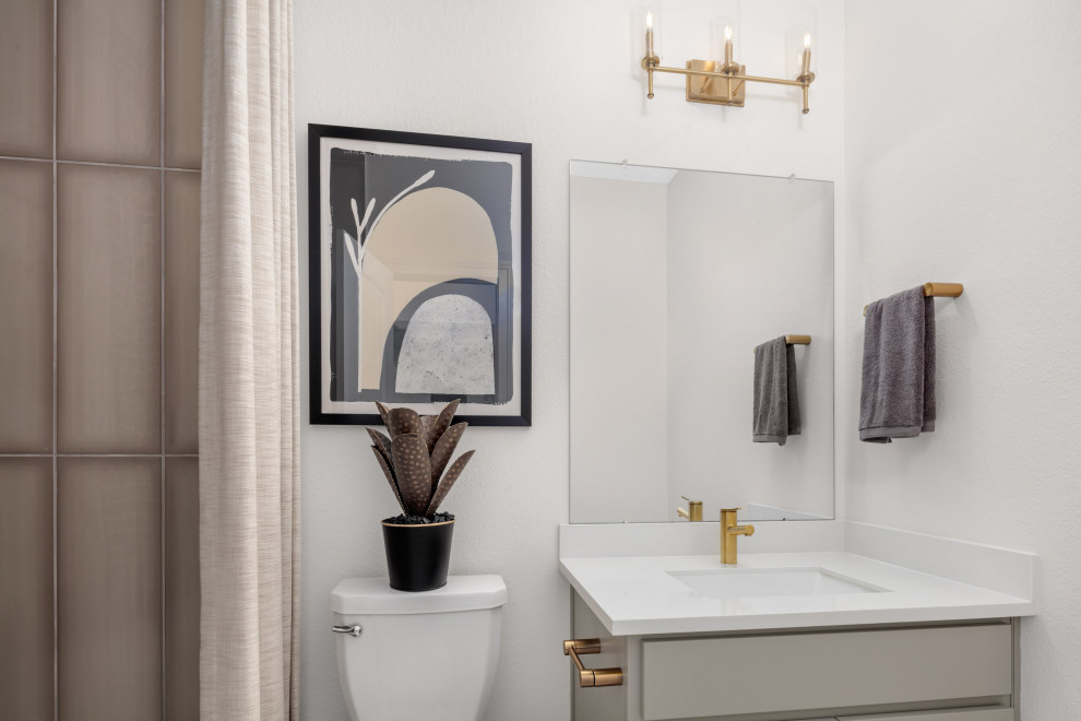Transitional powder room photo in Houston
