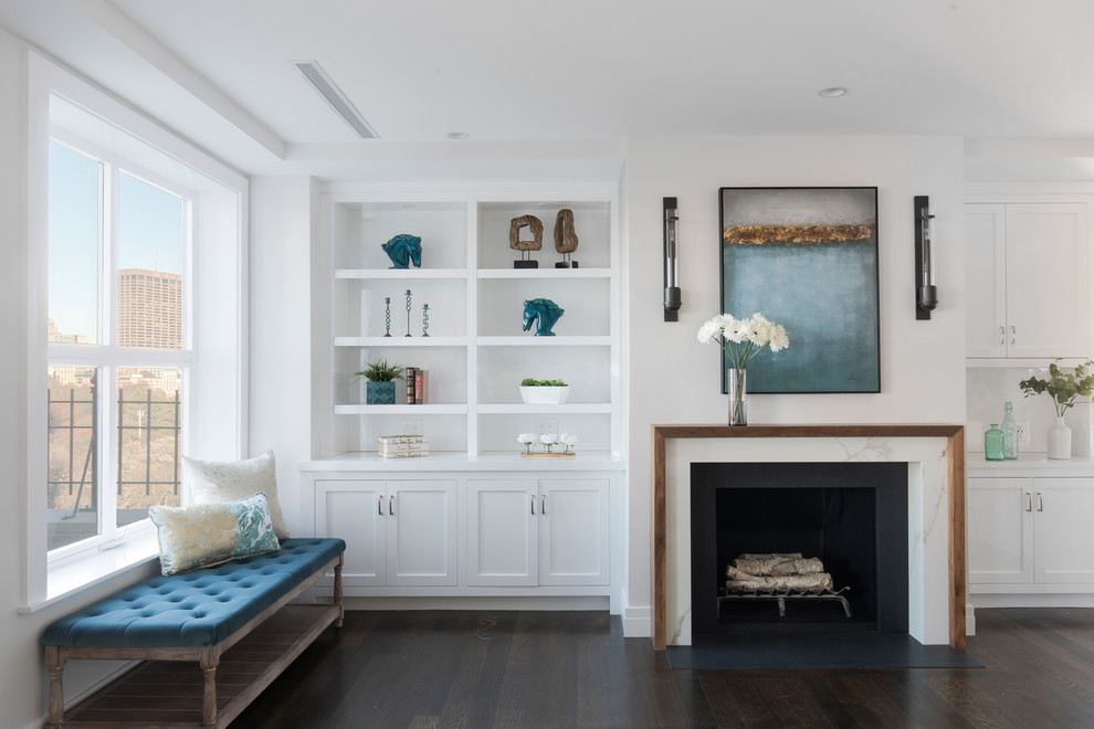 Photo of a contemporary formal open concept living room in Boston with white walls, dark hardwood floors, a standard fireplace, a metal fireplace surround, no tv and brown floor.