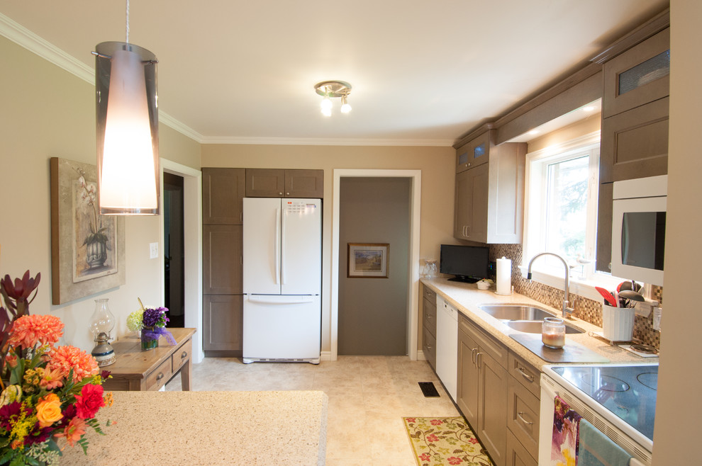 Example of a mid-sized transitional u-shaped vinyl floor and beige floor eat-in kitchen design in Toronto with a double-bowl sink, shaker cabinets, distressed cabinets, quartzite countertops, multicolored backsplash, mosaic tile backsplash, white appliances and a peninsula