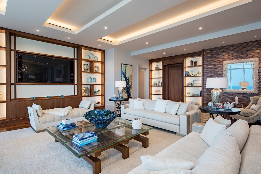 Photo of a large beach style open concept living room in Other with a built-in media wall, white walls, dark hardwood floors, no fireplace, brown floor and coffered.