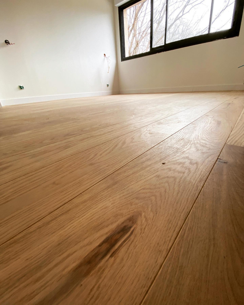 Pose d’un parquet collé en lame