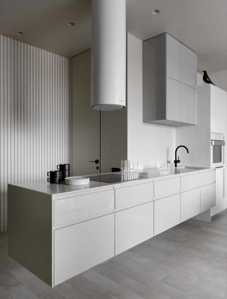 This is an example of a mid-sized contemporary single-wall separate kitchen in Moscow with an undermount sink, flat-panel cabinets, beige cabinets, quartz benchtops, beige splashback, white appliances, porcelain floors, no island, beige floor and beige benchtop.