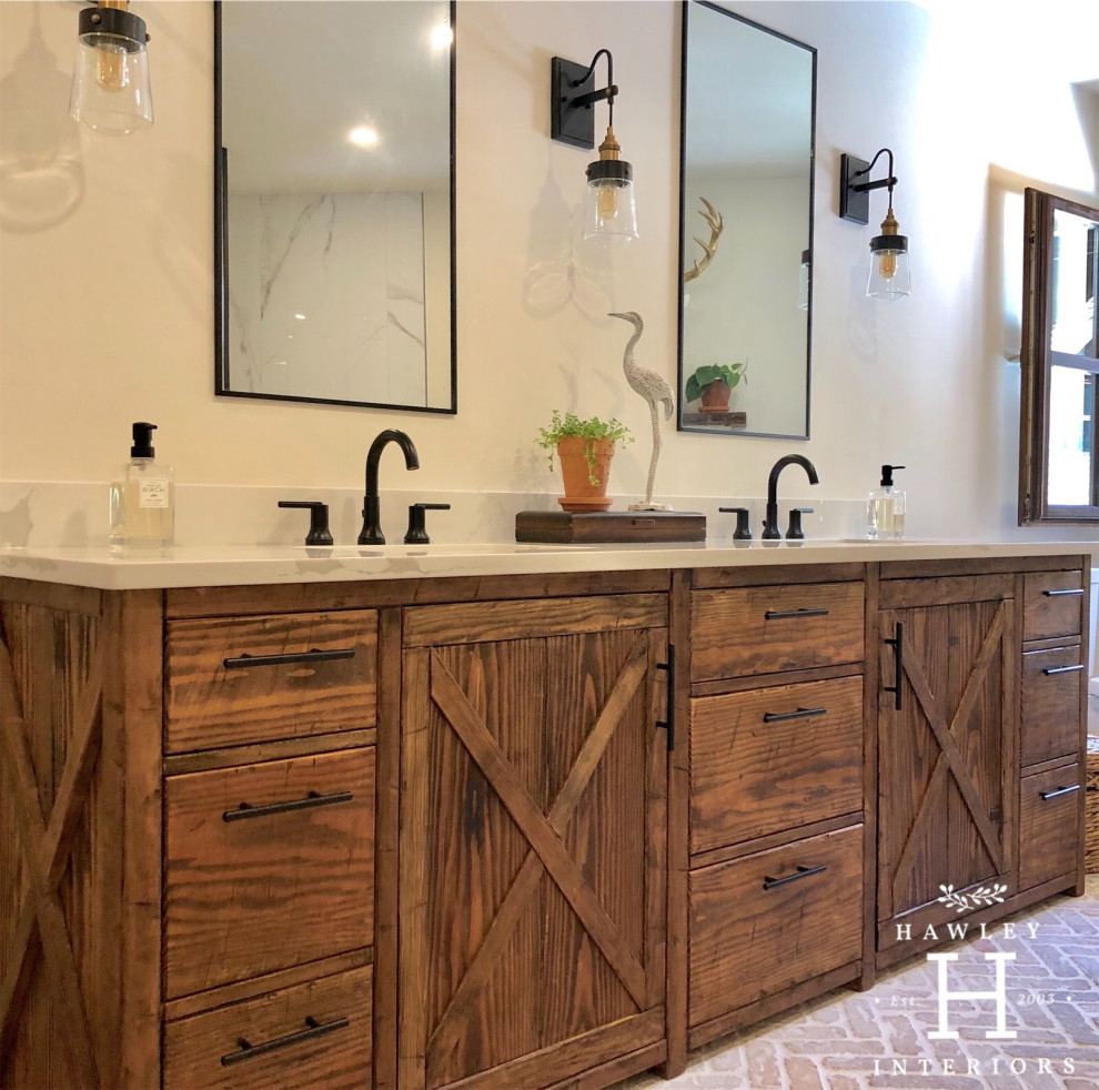 Design ideas for a large country master bathroom with recessed-panel cabinets, medium wood cabinets, brick floors, an undermount sink, solid surface benchtops and white benchtops.