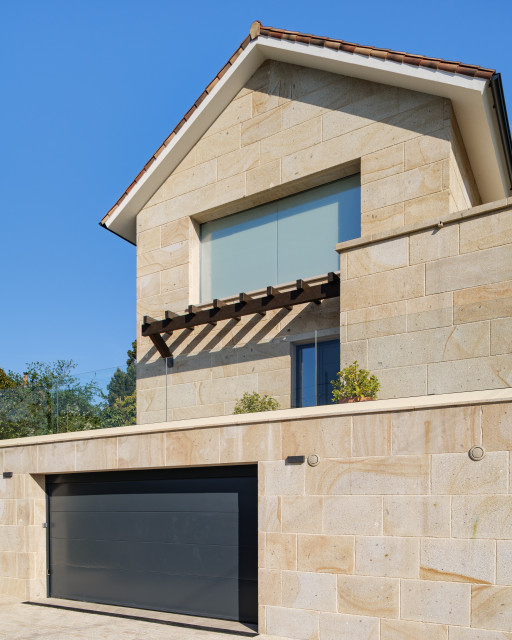 VIVENDA EN CABRAL transitional-house-exterior