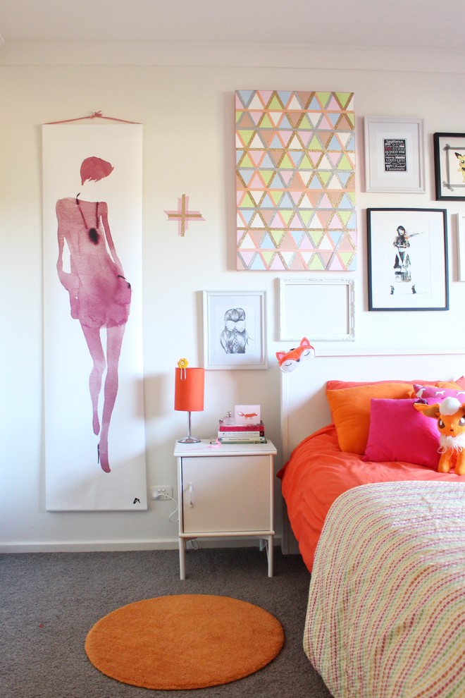 This is an example of an eclectic bedroom in Sydney with white walls.