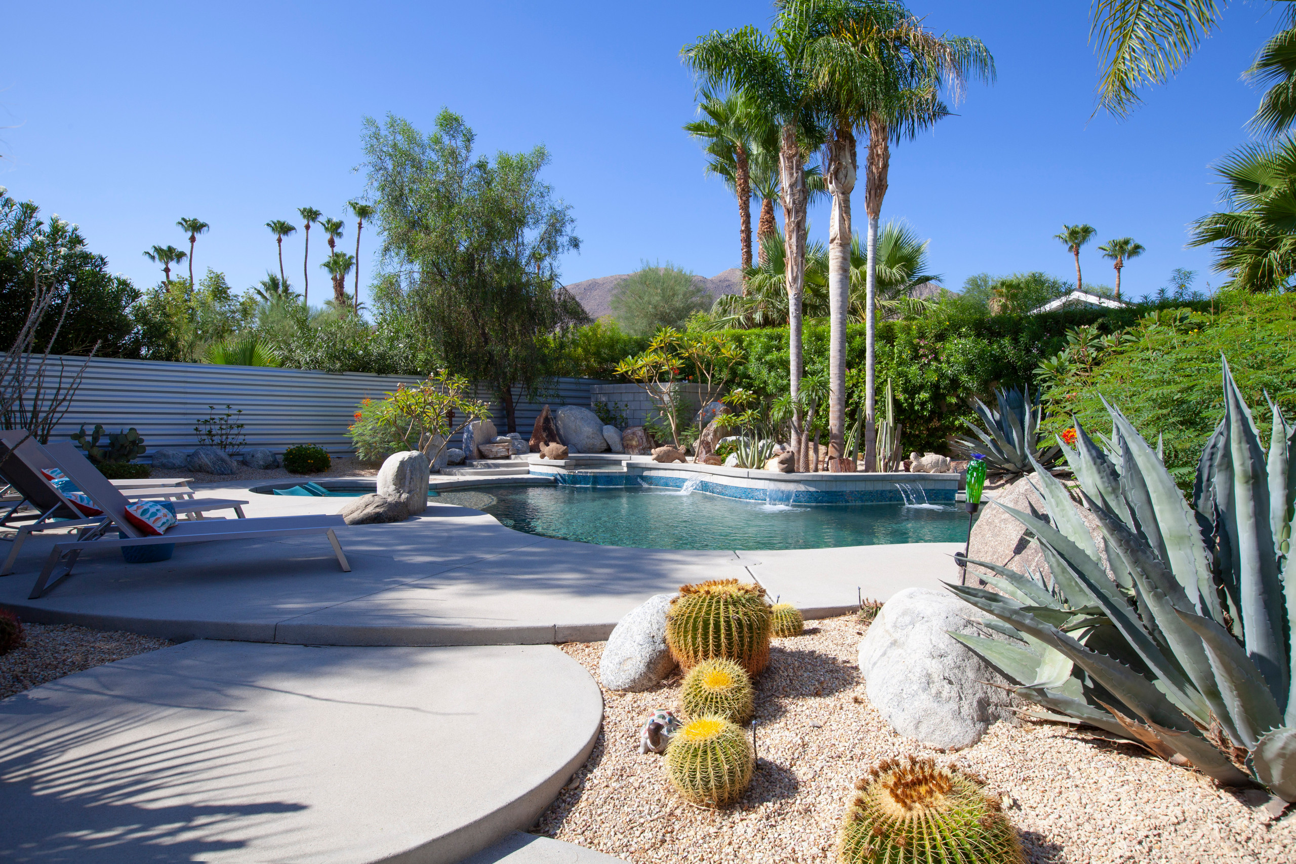 South facing pool area with acid release concrete finishing.