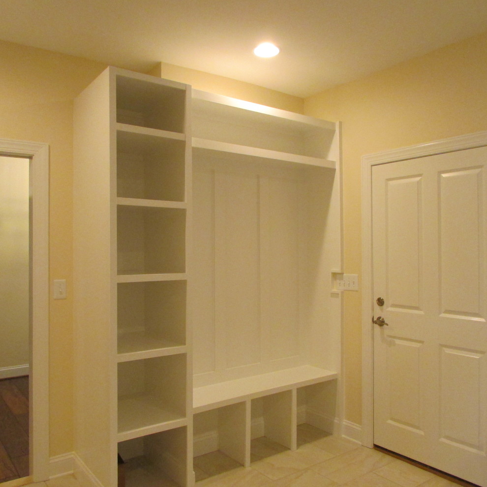 Example of a transitional laundry room design in Other
