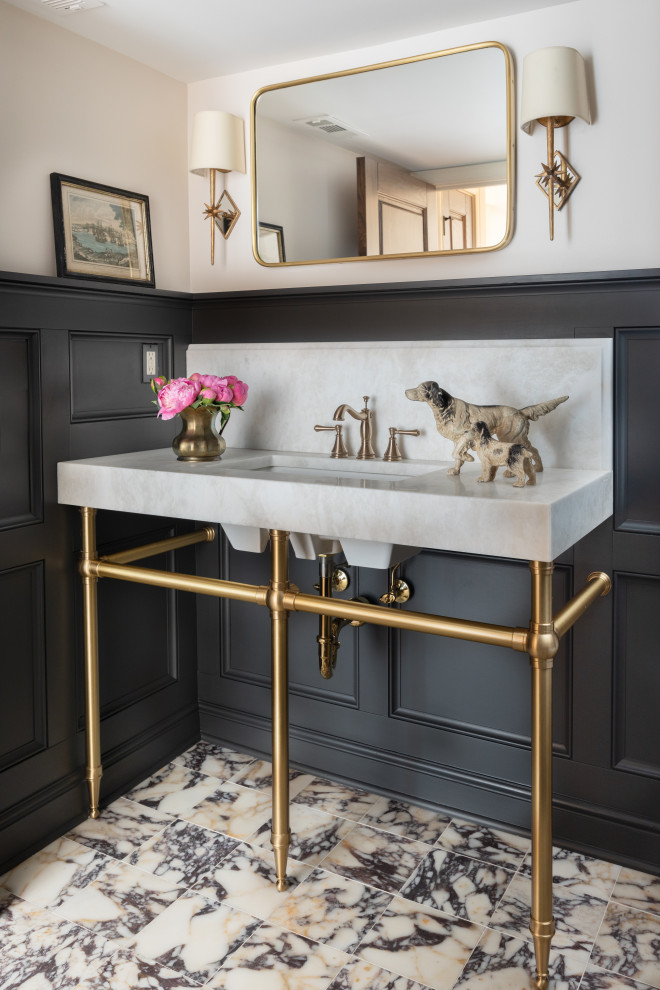 Powder room - transitional multicolored floor and wainscoting powder room idea in St Louis with white walls and an undermount sink