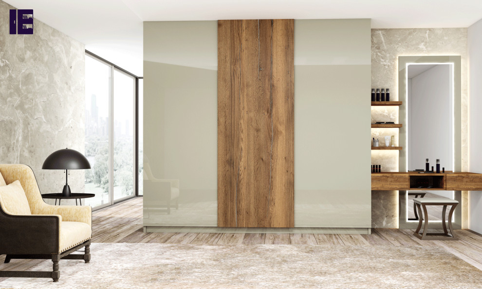 Inspiration for a large contemporary storage and wardrobe in London with flat-panel cabinets and beige cabinets.
