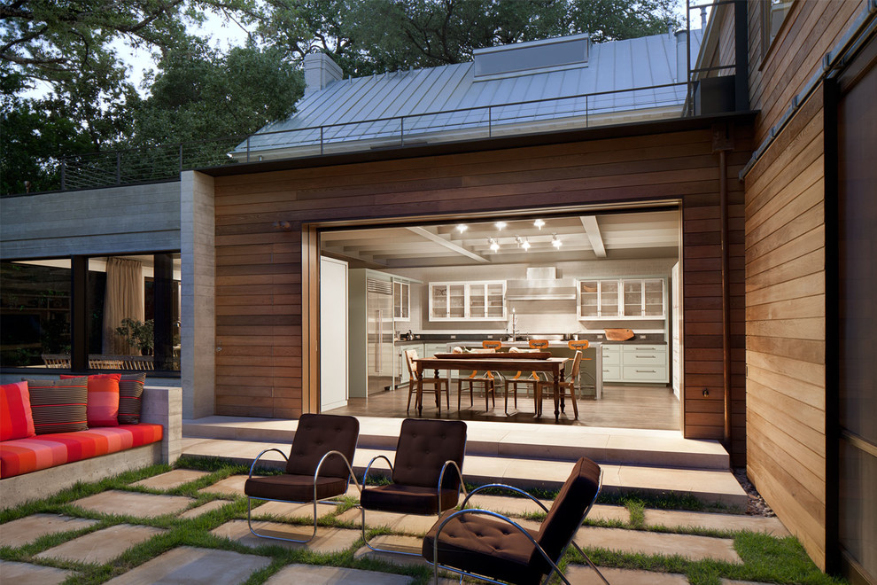 Inspiration for a transitional concrete paver patio remodel in Austin