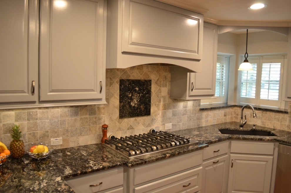 Inspiration for a transitional kitchen remodel in Houston with granite countertops, gray backsplash and ceramic backsplash