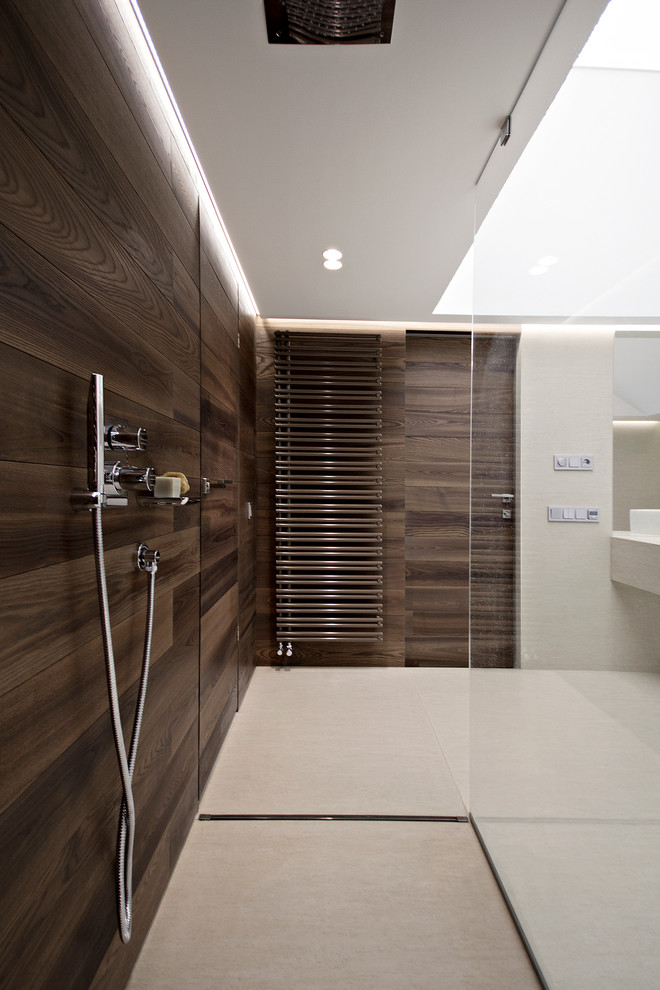 Photo of a contemporary bathroom in Moscow with an open shower, brown tile and an open shower.