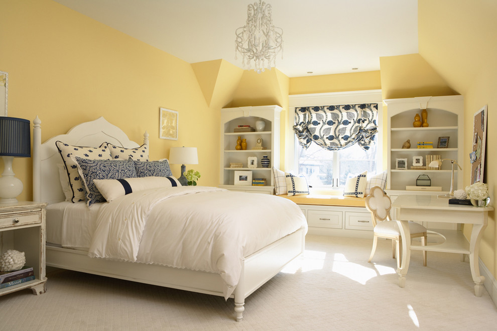 Inspiration for a traditional bedroom in Minneapolis with yellow walls and carpet.