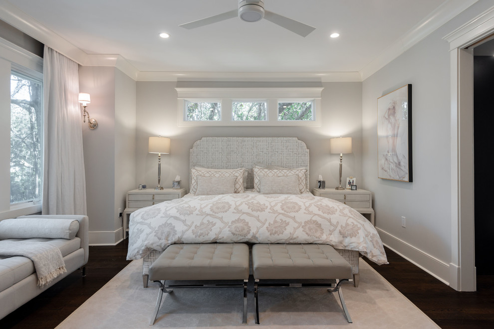 Design ideas for a mid-sized transitional master bedroom in Charleston with grey walls, dark hardwood floors and brown floor.