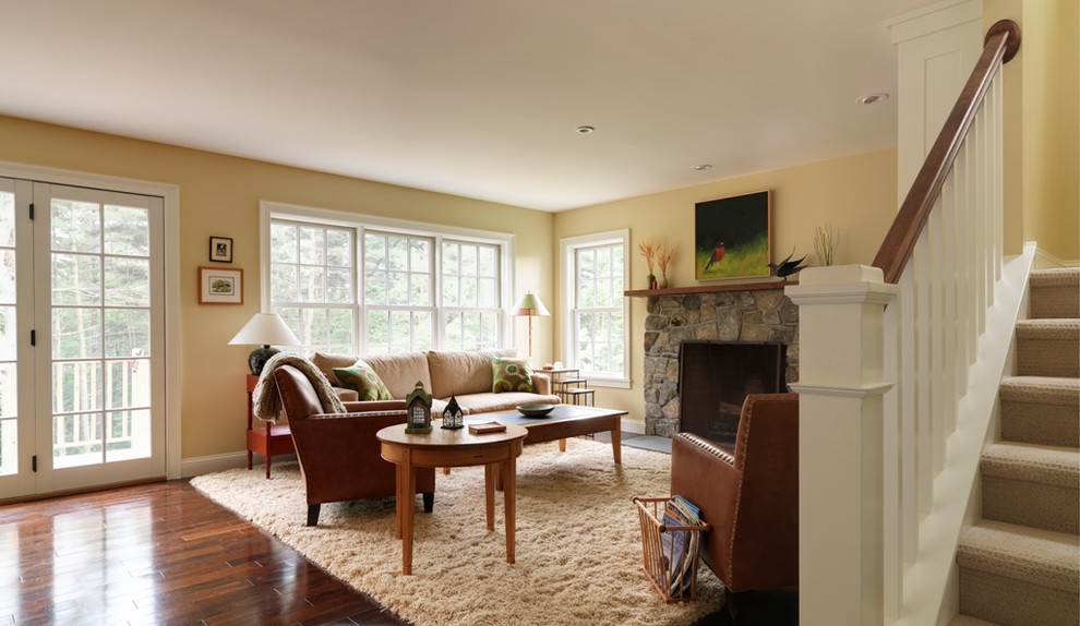 Design ideas for a traditional living room in Burlington with yellow walls.