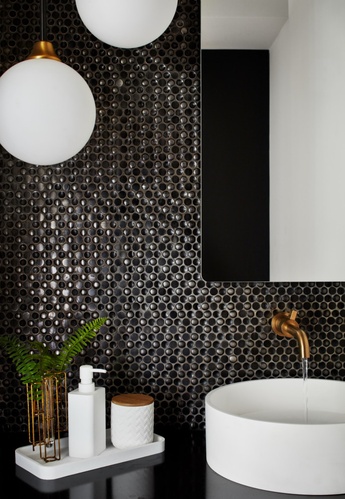 Small country powder room in New York with black cabinets, a two-piece toilet, black tile, mosaic tile, white walls, a pedestal sink, black benchtops and a floating vanity.