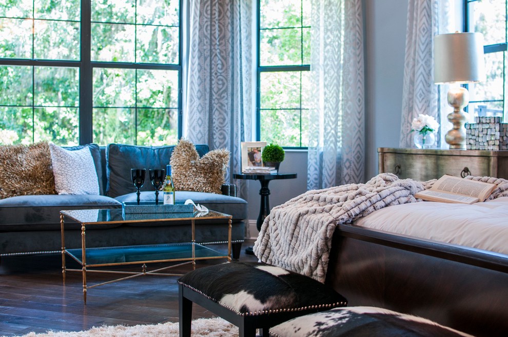 Design ideas for a traditional bedroom in Tampa with blue walls and dark hardwood floors.