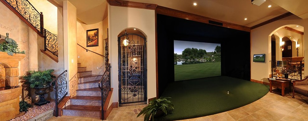 Large open concept home theatre in Phoenix with beige walls, limestone floors, a projector screen and beige floor.