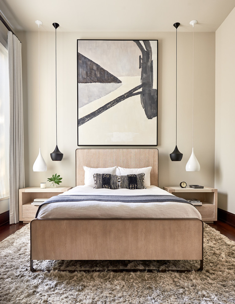 Design ideas for a mid-sized contemporary master bedroom in Charlotte with beige walls, dark hardwood floors, no fireplace and brown floor.