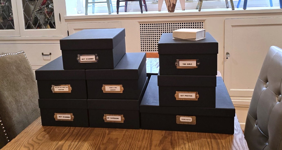 Photos organized in archival boxes by Simplify Buffalo Photo Organizing