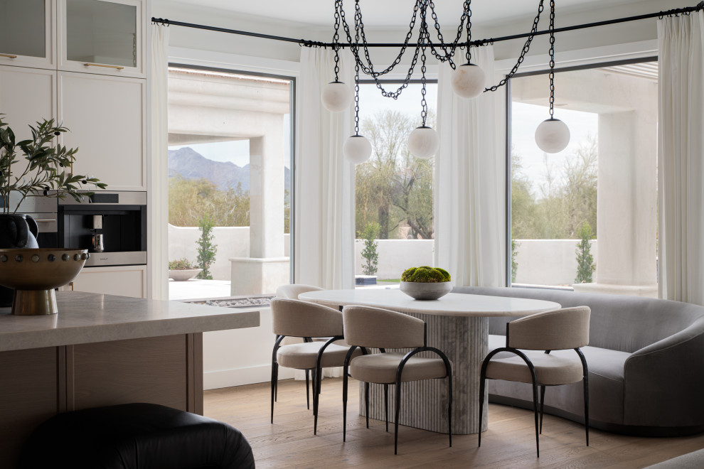 Example of a transitional dining room design in Phoenix