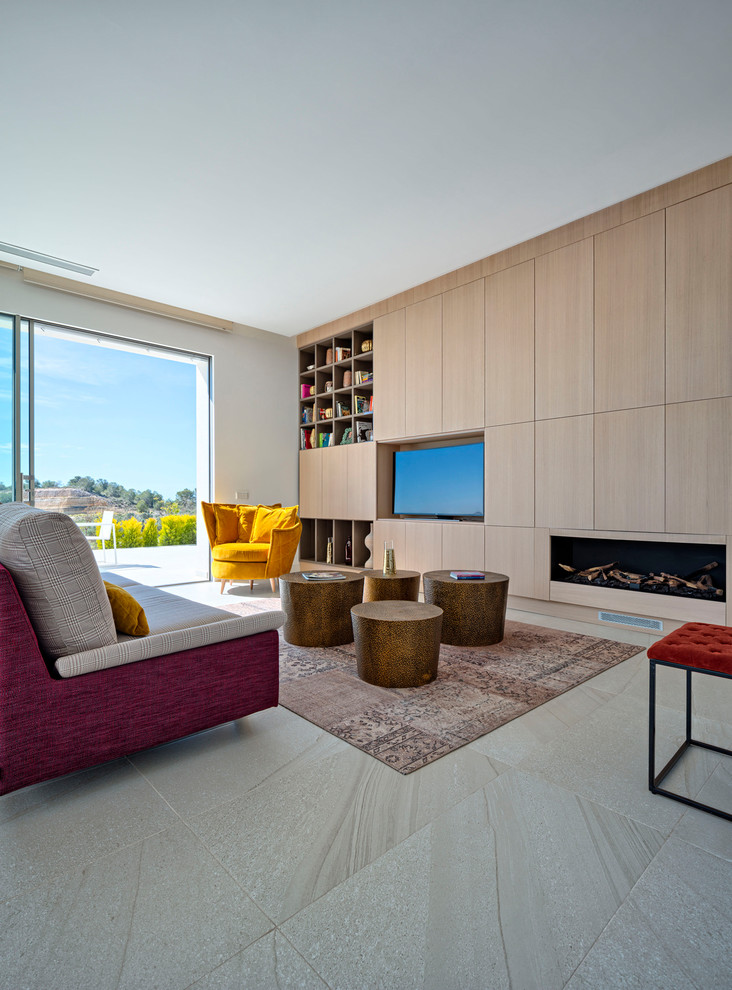 Photo of a large contemporary open concept living room in Alicante-Costa Blanca with white walls, a built-in media wall, white floor and a ribbon fireplace.