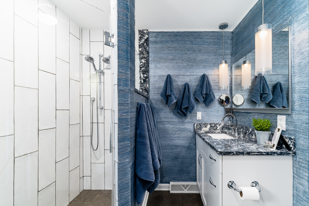 This is an example of a large transitional master bathroom in Columbus with flat-panel cabinets, white cabinets, blue walls, quartzite benchtops, brown floor, an alcove shower, medium hardwood floors, an undermount sink, an open shower, grey benchtops, a single vanity and a built-in vanity.
