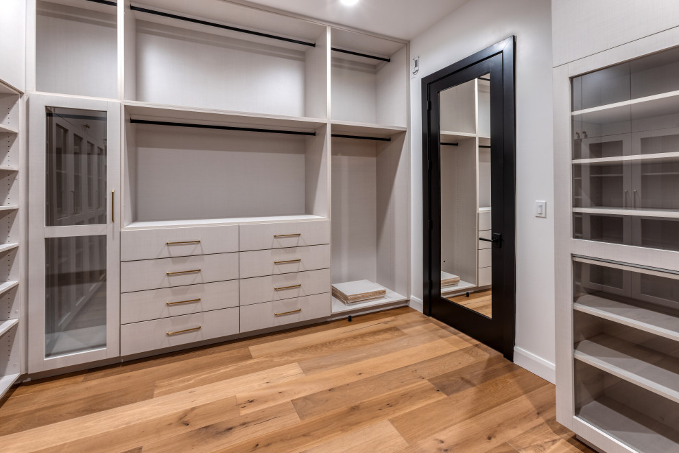 Custom Walk In Closet with Glass-Front Cabinets & Built In Drawers | French Coun