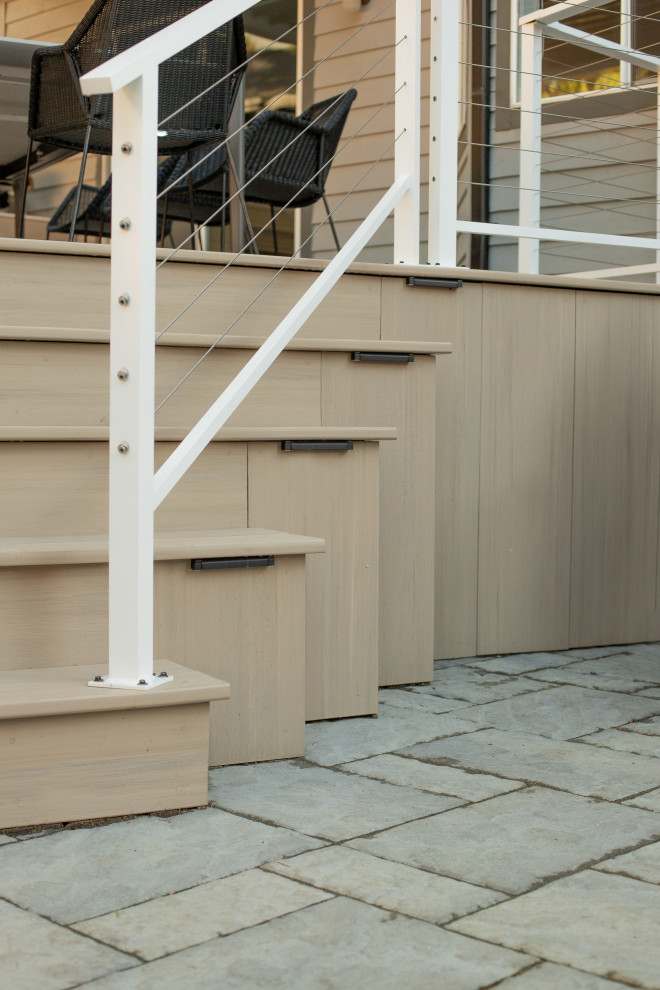 Example of a transitional home design design in Vancouver