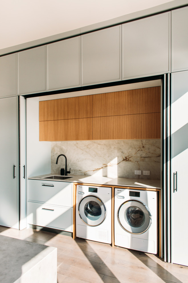 Contemporary laundry room in Wellington.
