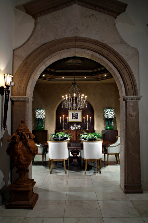 Traditional dining room in Phoenix with marble floors.