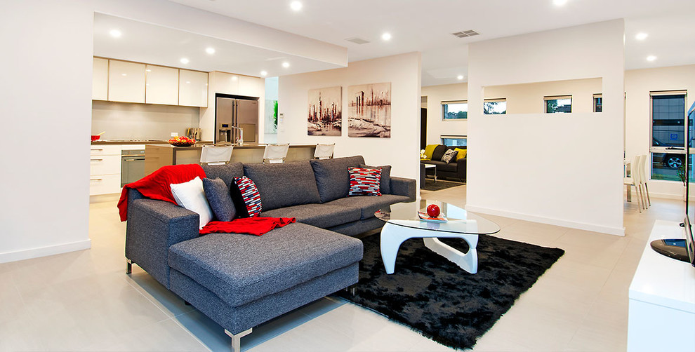 Contemporary open concept family room in Canberra - Queanbeyan with ceramic floors and a freestanding tv.