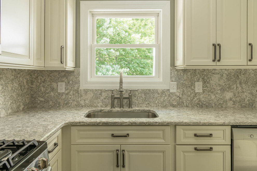 Open concept kitchen - mid-sized transitional u-shaped porcelain tile and multicolored floor open concept kitchen idea with an undermount sink, raised-panel cabinets, beige cabinets, quartz countertops, multicolored backsplash, quartz backsplash, stainless steel appliances, an island and multicolored countertops