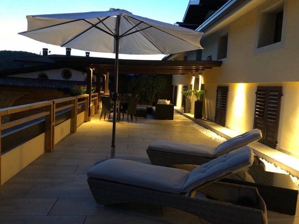 Photo of a large contemporary rooftop deck in Other.