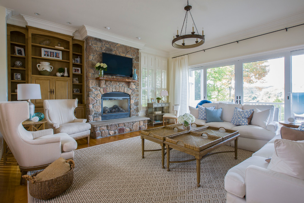 Photo of a large beach style living room in Baltimore.