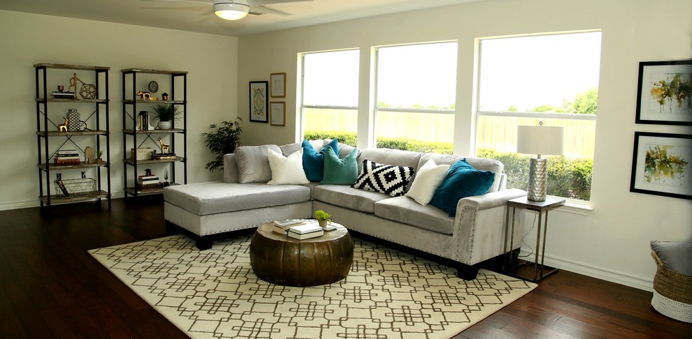 Inspiration for a large transitional open concept dark wood floor home design remodel in Austin with white walls