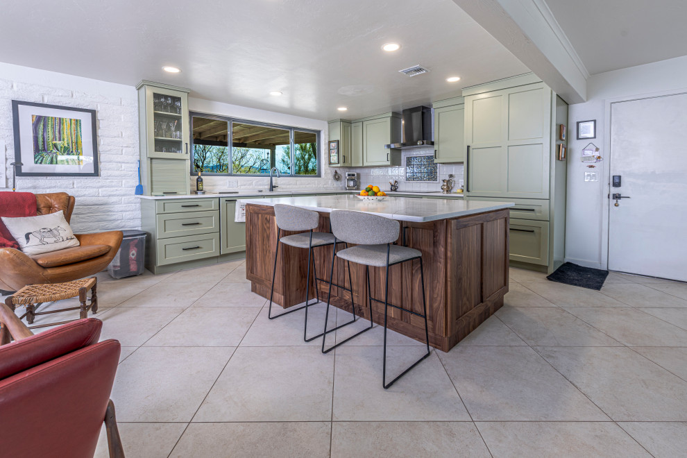 Large transitional l-shaped porcelain tile and beige floor kitchen photo in Phoenix with shaker cabinets, ceramic backsplash and an island