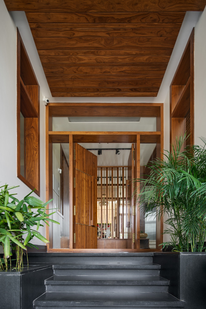 Inspiration for a contemporary entryway in Bengaluru.