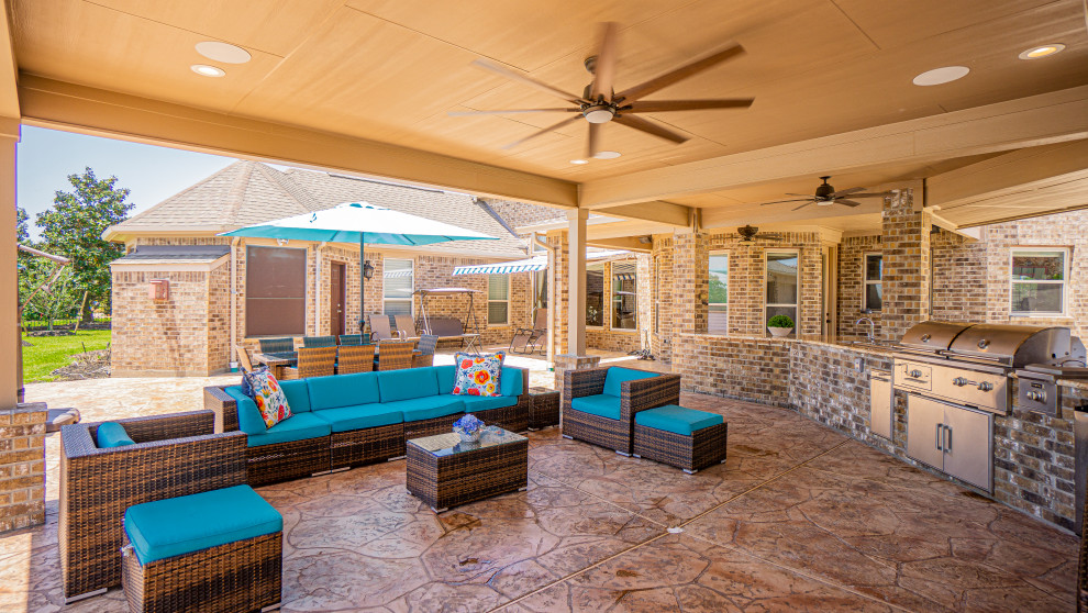 Inspiration for a large coastal backyard patio remodel in Houston