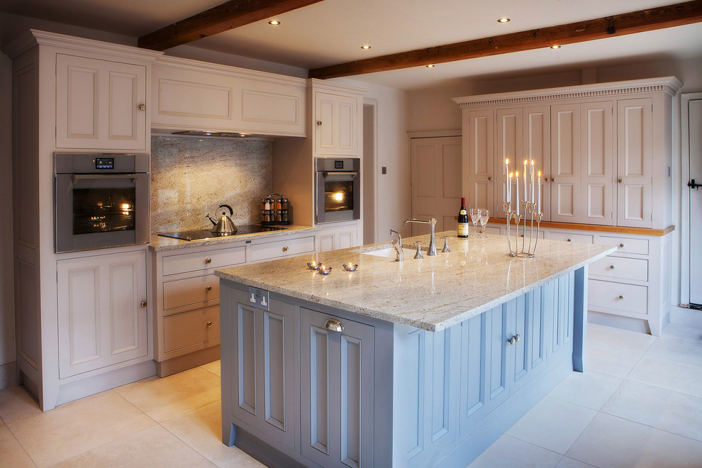 Contemporary kitchen in Other with beaded inset cabinets and grey cabinets.