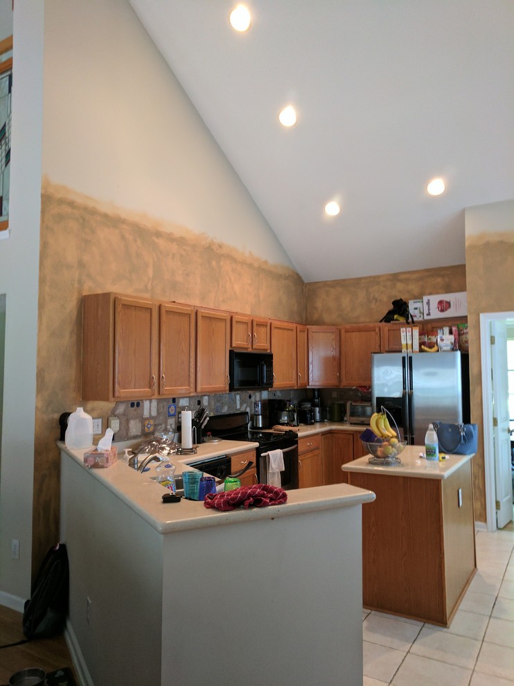 Example of a transitional kitchen design in Charlotte
