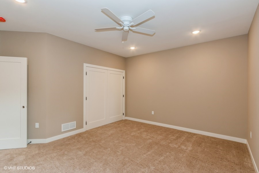 Example of a transitional home design design in Cedar Rapids