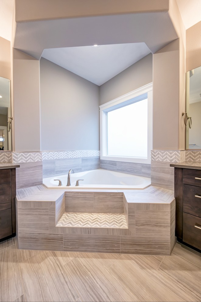 Large transitional master bathroom in Seattle with shaker cabinets, dark wood cabinets, a corner tub, a curbless shower, a two-piece toilet, grey walls, porcelain floors, an undermount sink, engineered quartz benchtops, grey floor and a shower curtain.