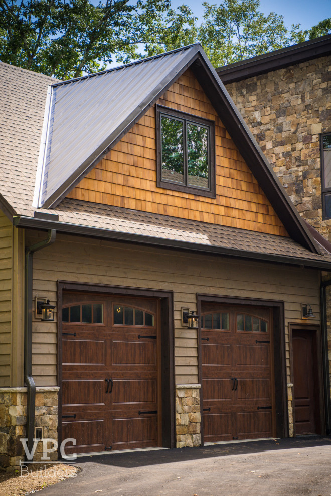 Example of an arts and crafts garage design in Charlotte