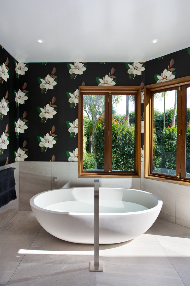Design ideas for a large transitional master bathroom in Auckland with a freestanding tub and multi-coloured walls.
